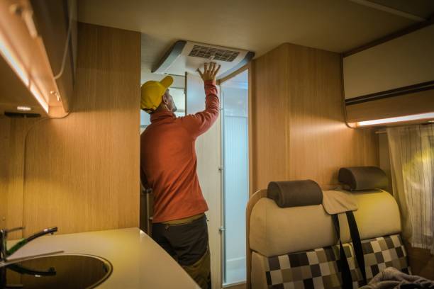 Technician servicing a home HVAC unit